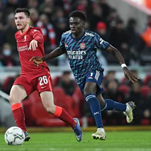 Bukayo Saka Closes In on Robertson: Intense Moment from Carabao Cup Semi-Final First Leg between Liverpool and Arsenal