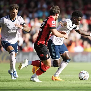 Bukayo Saka Faces Off Against Ben Pearson: AFC Bournemouth vs Arsenal FC, 2022-23 Premier League