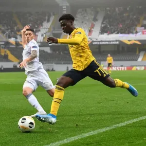Bukayo Saka Faces Off Against Bruno Duarte: Vitoria Guimaraes vs. Arsenal, UEFA Europa League, 2019 Bukayo Saka Faces Off Against Bruno Duarte: Vitoria Guimaraes vs. Arsenal, UEFA Europa League, 2019