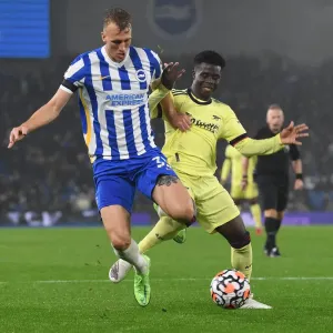 Bukayo Saka vs Dan Burn: Intense Battle in Brighton & Hove Albion vs Arsenal Premier League Clash