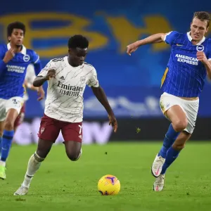 Bukayo Saka vs Dan Burn: Intense Head-to-Head Battle in Arsenal's Triumph over Brighton & Hove Albion, Premier League 2020-21