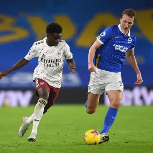 Bukayo Saka vs. Dan Burn: A Tactical Showdown in Arsenal's Clash with Brighton, Premier League 2020-21
