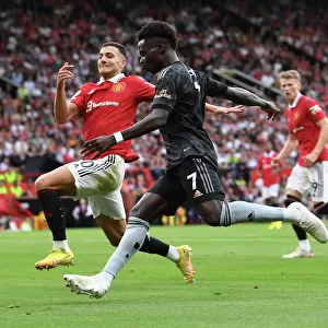 Bukayo Saka vs Diogo Dalot: Intense Battle at Old Trafford - Manchester United vs Arsenal, Premier League 2022-23