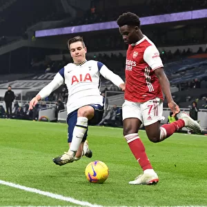 Bukayo Saka vs. Giovanni Lo Celso: Battle at the Tottenham Hotspur Stadium - Arsenal vs. Tottenham Premier League Clash (December 2020)