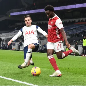 Bukayo Saka vs. Giovanni Lo Celso: Battle at the Tottenham Hotspur Stadium - Arsenal vs. Tottenham Premier League Clash (December 2020) Bukayo Saka vs. Giovanni Lo Celso: Battle at the Tottenham Hotspur Stadium - Arsenal vs. Tottenham Premier League Clash (December 2020)