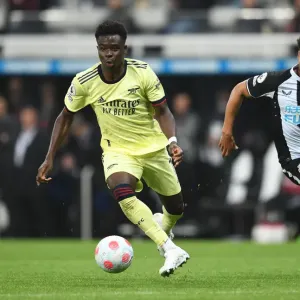 Bukayo Saka vs Jacob Murphy: Intense Battle at St. James Park - Arsenal vs Newcastle United, Premier League 2021-22 Bukayo Saka vs Jacob Murphy: Intense Battle at St. James Park - Arsenal vs Newcastle United, Premier League 2021-22