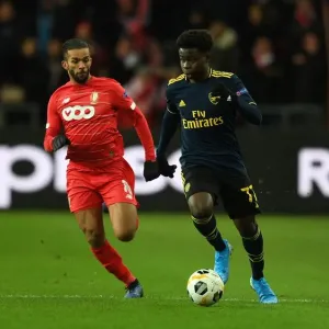 Bukayo Saka vs Mehdi Carcela: A Europa League Battle at Standard Liege Bukayo Saka vs Mehdi Carcela: A Europa League Battle at Standard Liege