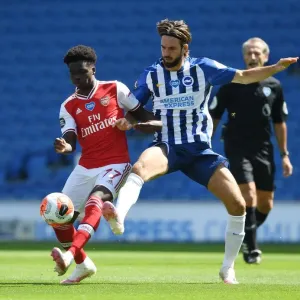 Bukayo Saka vs. Propper: Empty Stadium Showdown - Brighton vs. Arsenal Amidst the Pandemic