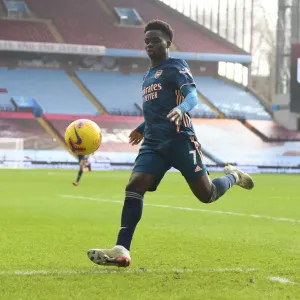 Bukayo Saka's Brilliant Performance at Empty Villa Park: Arsenal's Premier League Victory Amidst COVID-19 Restrictions