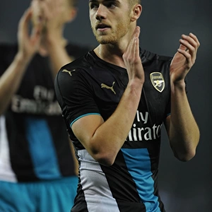 Calum Chambers Celebrates Arsenal's Victory Over Sheffield Wednesday with a Heartfelt Applause to Fans