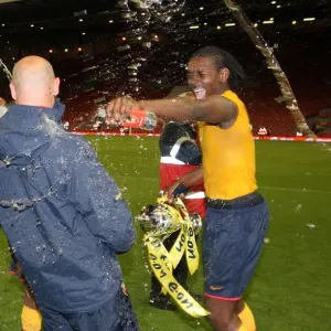 Captain Jay Thomas soaks Youth Team Coach Steve Bould Print Captain Jay Thomas soaks Youth Team Coach Steve Bould Print