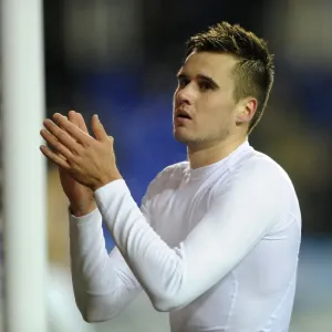 Carl Jenkinson celebrates in a print of Arsenal's 7-5 Capital One Cup win Carl Jenkinson celebrates in a print of Arsenal's 7-5 Capital One Cup win