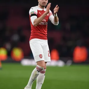 Carl Jenkinson Celebrates Carabao Cup Victory with Arsenal Fans