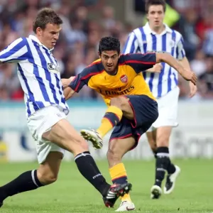 Carlos vela (Arsenal) Andy Butler (Huddersfield) Carlos vela (Arsenal) Andy Butler (Huddersfield)