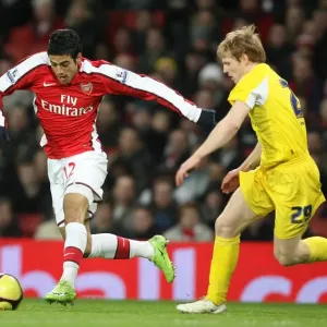 Carlos Vela (Arsenal) Chris Burke (Cardiff)