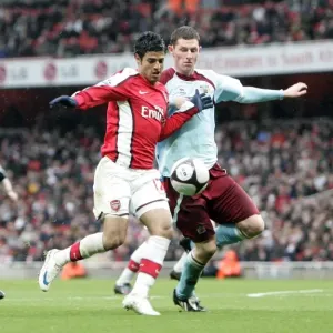 Carlos Vela (Arsenal) Christian Kalvenes and Chris McCann (Burnley)
