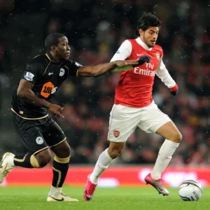 Carlos Vela (Arsenal) Hendry Thomas (Wigan). Arsenal 2: 0 Wigan Athletic