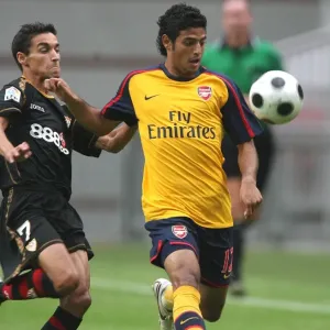 Carlos Vela (Arsenal) Jesus Gonzalez (Seville) Carlos Vela (Arsenal) Jesus Gonzalez (Seville)