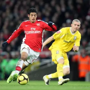 Carlos Vela (Arsenal) Kevin McNaughton (Cardiff)