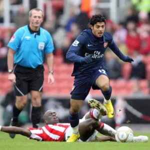 Carlos Vela (Arsenal) Mamady Sidibe (Stoke). Stoke City 3: 1 Arsenal. FA Cup 4th Round Carlos Vela (Arsenal) Mamady Sidibe (Stoke). Stoke City 3: 1 Arsenal. FA Cup 4th Round
