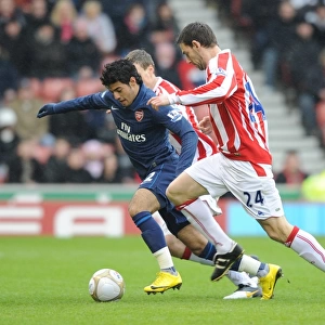 Carlos Vela (Arsenal) Rory Delap and Robert Huth (Stoke). Stoke City 3: 1 Arsenal