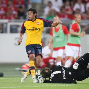 Carlos Vela (Arsenal) scores a goal past Jens Lehmann (Stuttgart) Carlos Vela (Arsenal) scores a goal past Jens Lehmann (Stuttgart)
