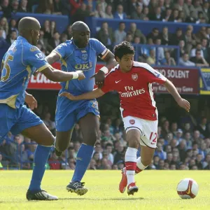 Carlos Vela (Arsenal) Sol Campbell and Sylvain Distin (Portsmouth)