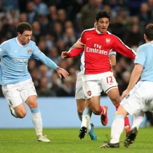 Carlos Vela (Arsenal) Wayne Bridge and Gareth Barry (Man City). Manchester City 3
