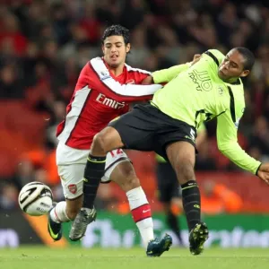 Carlos Vela (Arsenal) Wilson Palacios (Wigan)