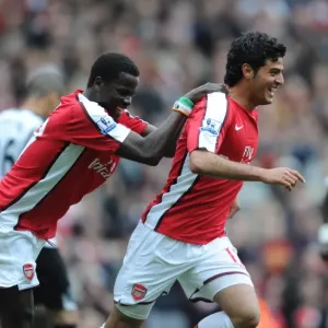 Carlos Vela celebrates scoring the 4th Arsenal goal with Emmanuel Eboue Carlos Vela celebrates scoring the 4th Arsenal goal with Emmanuel Eboue