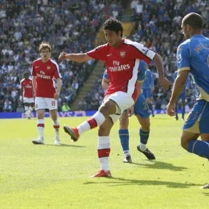 Carlos Vela shoots past Portsmouth goalkeeper David