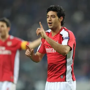 Carlos Vela Sparks Arsenal's UEFA Champions League Battle against FC Porto: 1st Leg