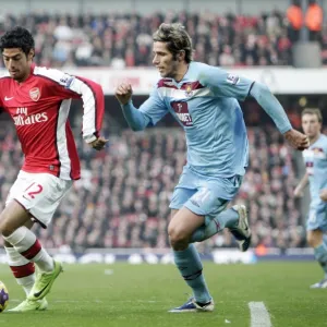 Carls Vela (Arsenal) Valon Behrami (West Ham)