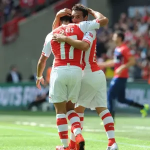 Cazorla and Sanchez Celebrate Arsenal's First Goal Against Manchester City - FA Community Shield 2014/15 Cazorla and Sanchez Celebrate Arsenal's First Goal Against Manchester City - FA Community Shield 2014/15