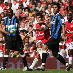Cecs Fabregas (Arsenal) Luis Jimenez (Inter)