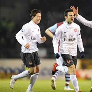 Celebrating Glory: Fabregas, Nasri, and Silvestre Rejoice in Arsenal's Turf Moor Draw