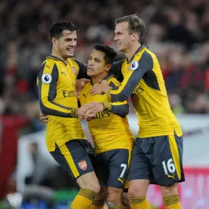 Celebrating a Goal: Alexis Sanchez, Rob Holding, and Granit Xhaka (Middlesbrough vs. Arsenal, 2016-17) Celebrating a Goal: Alexis Sanchez, Rob Holding, and Granit Xhaka (Middlesbrough vs. Arsenal, 2016-17)
