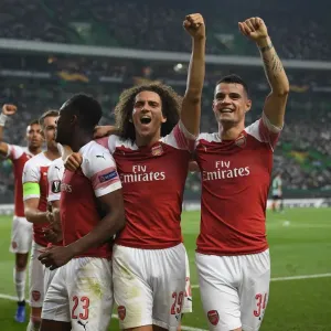 Celebrating a Goal: Welbeck, Guendouzi, and Xhaka (Sporting Lisbon vs Arsenal, 2018-19) Celebrating a Goal: Welbeck, Guendouzi, and Xhaka (Sporting Lisbon vs Arsenal, 2018-19)