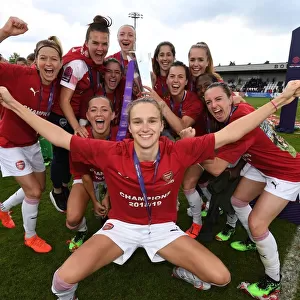 Celebrating Victory: Arsenal Women's Team Gathers After Defeating Manchester City
