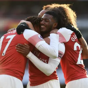 Celebrating Victory: Iwobi and Maitland-Niles Rejoice After Arsenal's Third Goal vs Burnley (2018-19)