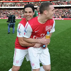 Celebrating Victory: Mikel Arteta and Thomas Vermaelen, Arsenal FC