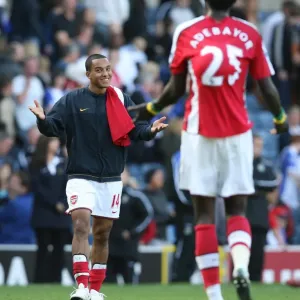 Celebrating Victory: Theo Walcott and Emmanuel Adebayor, Arsenal's Unstoppable Duo Celebrating Victory: Theo Walcott and Emmanuel Adebayor, Arsenal's Unstoppable Duo