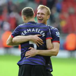 Print of Vermaelen and Mertesacker Celebrating Victory Print of Vermaelen and Mertesacker Celebrating Victory