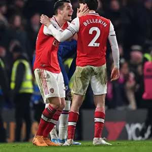 Celebrating Victory: Xhaka and Bellerin Rejoice After Arsenal's Win Against Chelsea