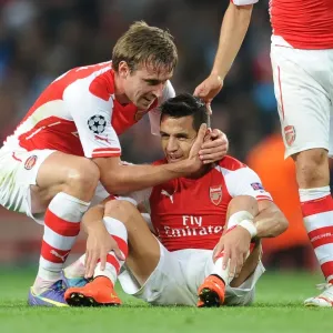 Celebration at Emirates: Monreal and Sanchez Reunite After Arsenal's UEFA Champions League Victory