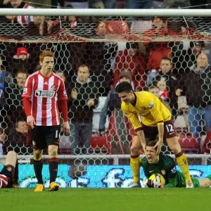 Celebration at the Final Whistle: Wojciech Szczesny and Olivier Giroud of Arsenal
