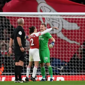 Celebration Time: Leno and Bellerin Rejoice in Arsenal's Victory over Tottenham
