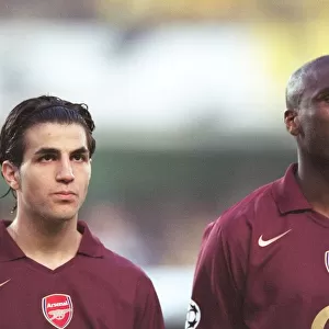 Cesc Fabrega and Sol Campbell (Arsenal) line up before the match