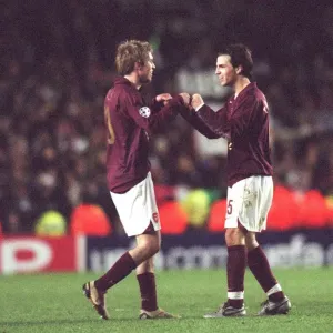 Cesc Fabregas and Alex Hleb (Arsenal) celebrates at the end of the match