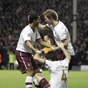 Cesc Fabregas and Alex Hleb celebrate Arsenals 2nd goal with the creator Theo Walcott Cesc Fabregas and Alex Hleb celebrate Arsenals 2nd goal with the creator Theo Walcott